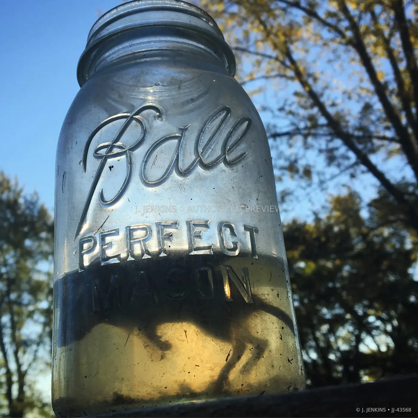 Close view of a vintage glass preserving jar